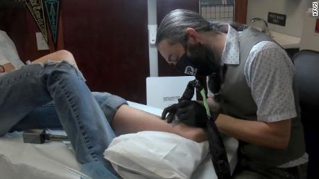 A tattoo shop is offering to cover up hate and gang symbols for free