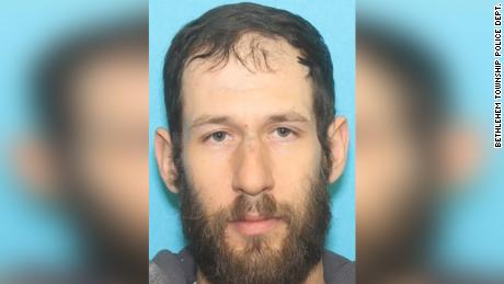  Man charged with shooting at a cigar shop employee after being asked to wear a mask