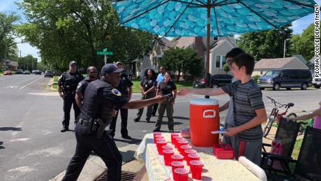  Two boys selling lemonade were robbed at gunpoint. Their community stepped in to help