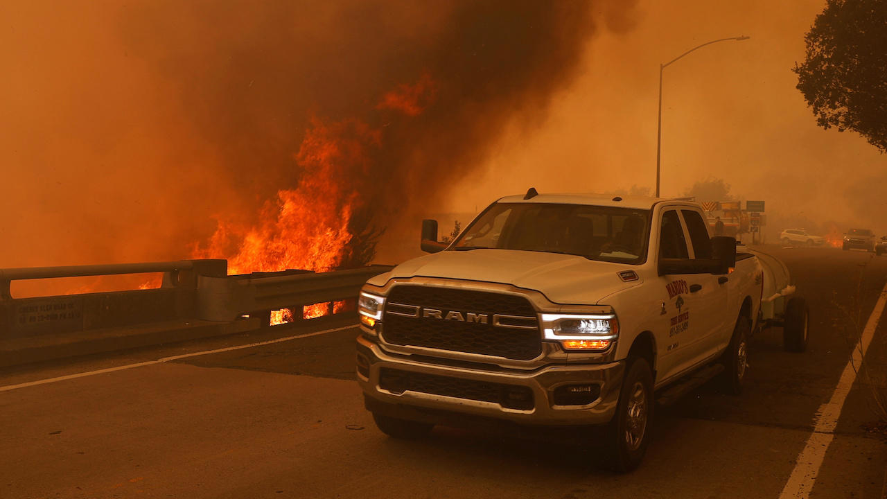  California wildfires force tens of thousands to flee their homes