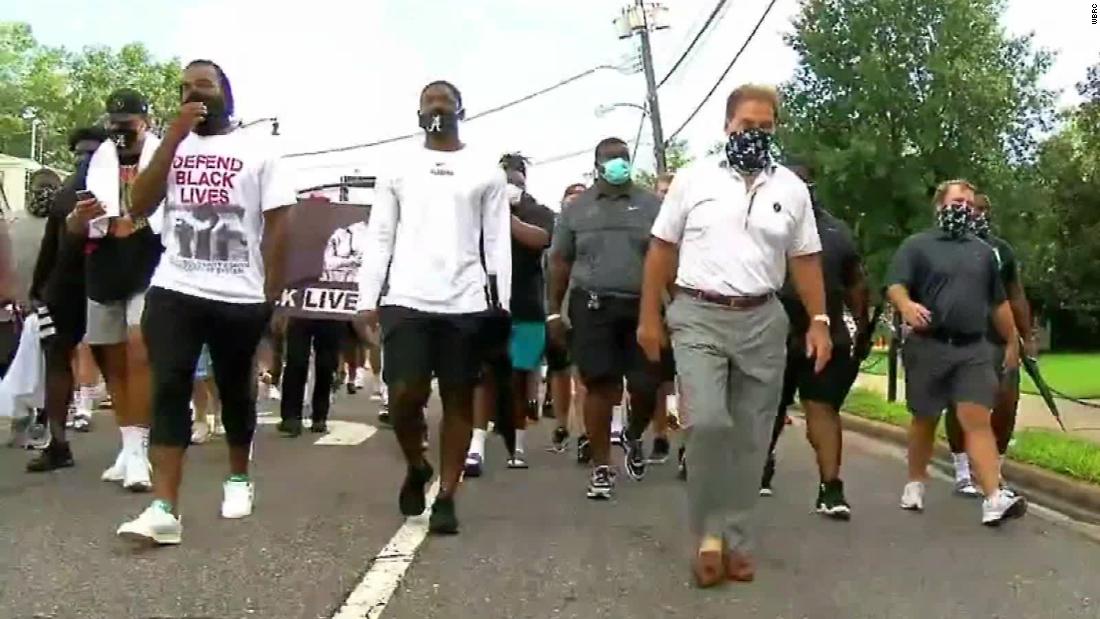  Alabama football players’ march for equality ends at the spot where Blacks were told they weren’t welcome years ago