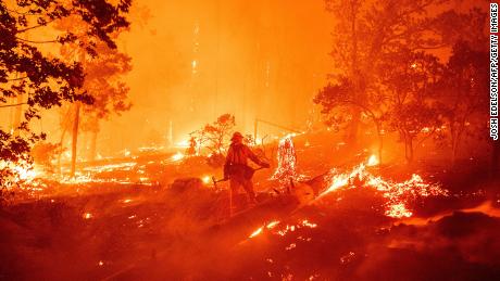 California wildfires: Helicopter rescues resume for people trapped by Creek Fire