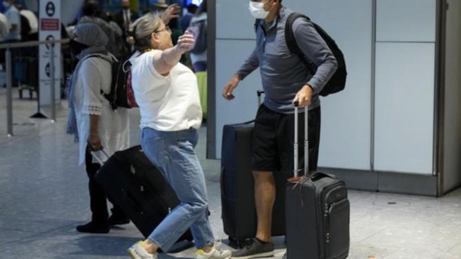  After an 18-month separation, families reunite at Heathrow’s