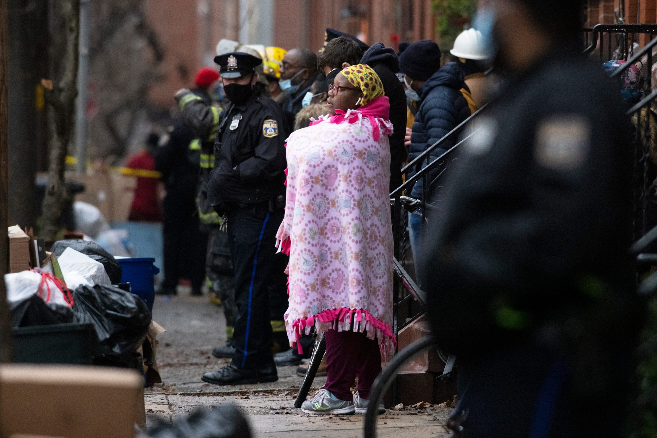  Seven Children Among 13 Burned to Death in Flat Fire