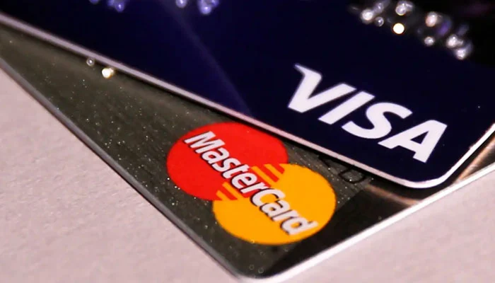 Visa and Mastercard on table