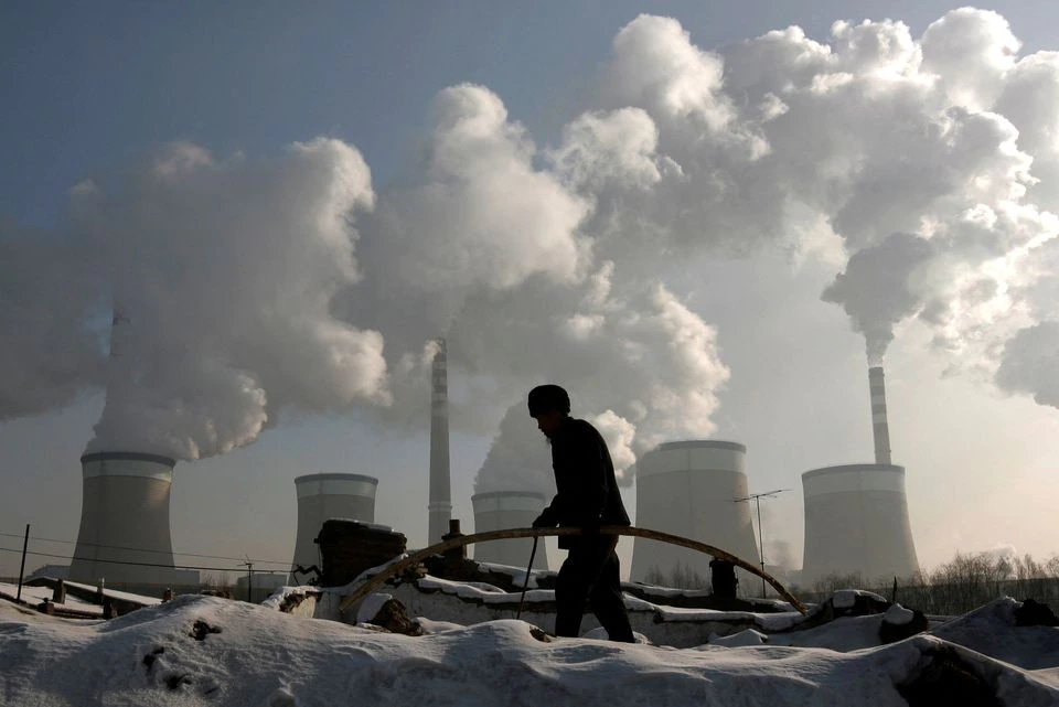 a worker works near power plant situated in Shanxi province