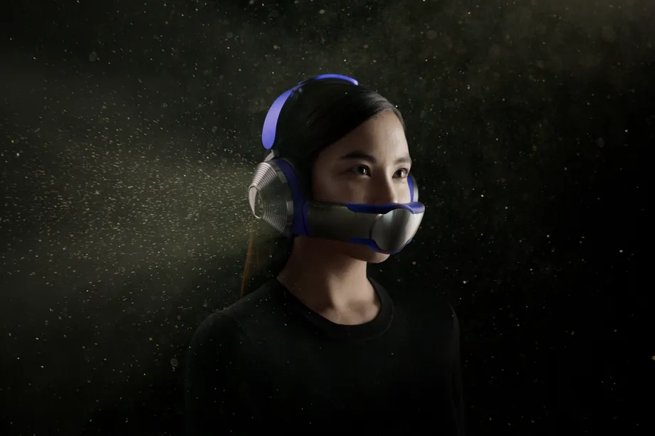 A girl wearing the Dyson headphone with build-in air purifier and noise controller