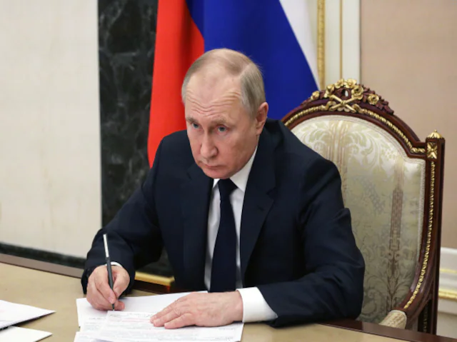 Putin attending a meeting